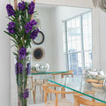 Lila Vanda Orchids and Driftwood in a Conical Glass Cylinder